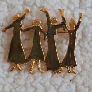 Vintage gold tone rejoicing brooch